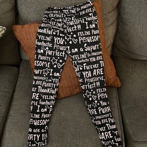 Black with light pink words